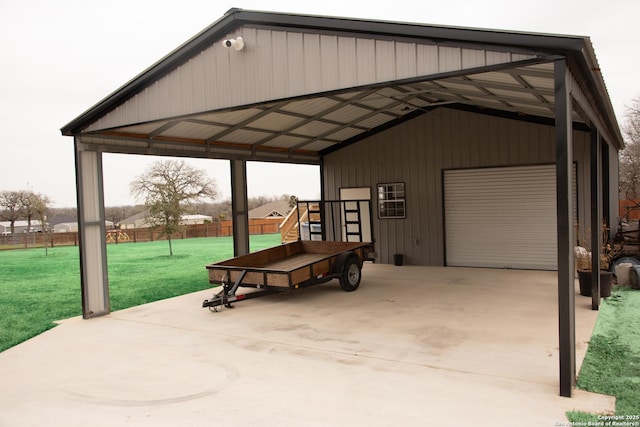 exterior space with a carport, a garage, and a lawn