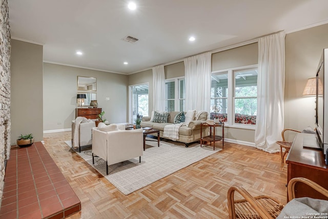 living room featuring ornamental molding and light parquet floors