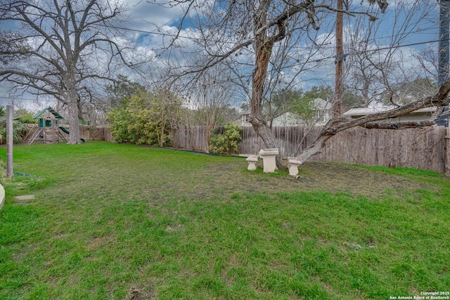 view of yard with a playground