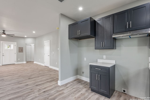 kitchen featuring ceiling fan and light wood-type flooring