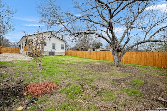 view of yard featuring central AC unit