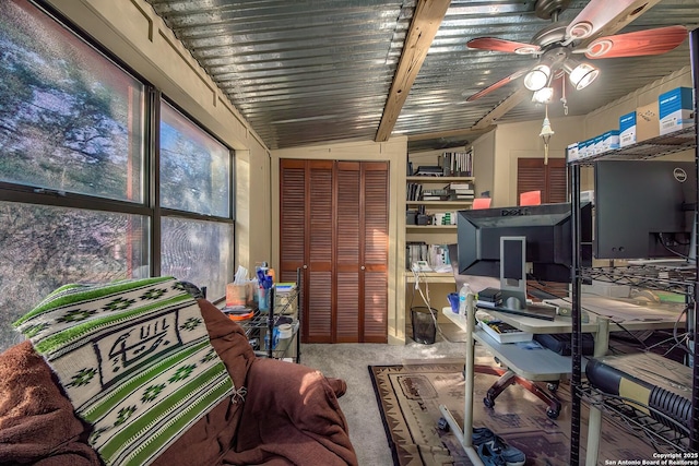 office area with ceiling fan and carpet