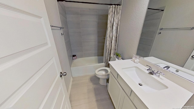 full bathroom with shower / tub combo with curtain, vanity, and toilet