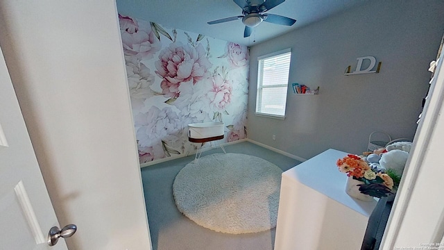 carpeted bedroom with ceiling fan