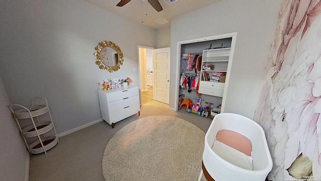 carpeted bedroom with ceiling fan