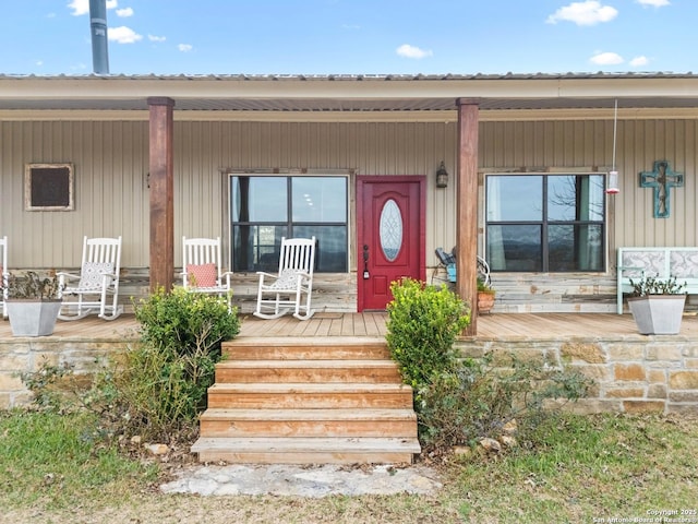 property entrance with a porch