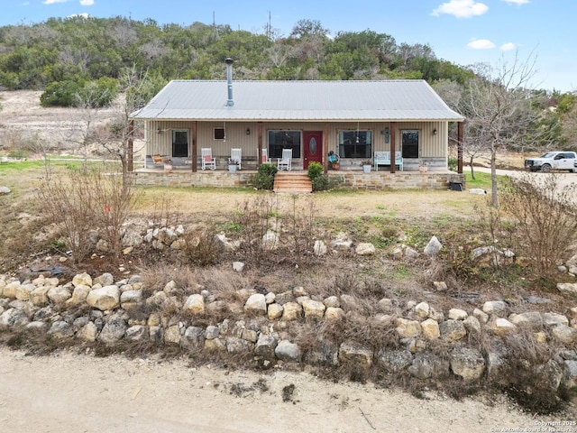 view of front of home featuring covered porch