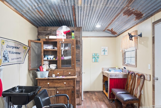 interior space with lofted ceiling, wood ceiling, and wood-type flooring