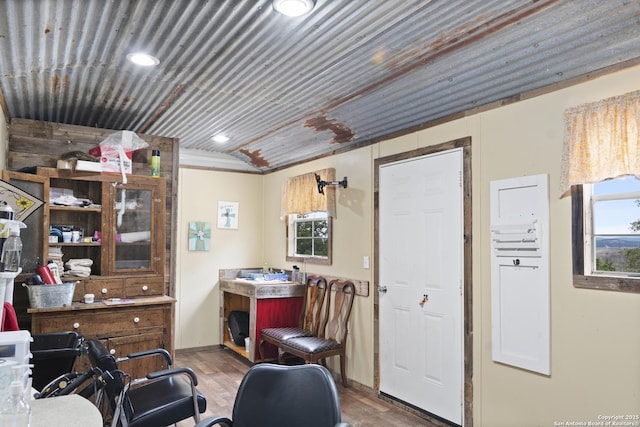 interior space with vaulted ceiling and hardwood / wood-style floors