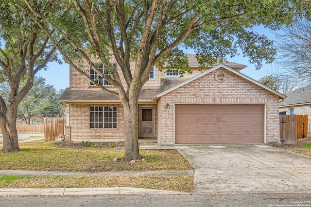 front of property featuring a garage and a front lawn