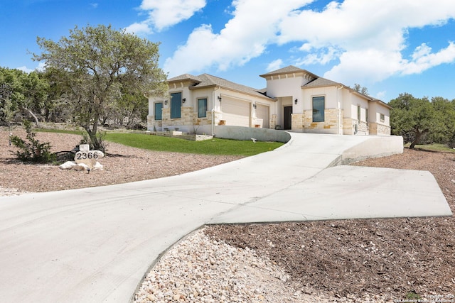 view of front of home with a garage