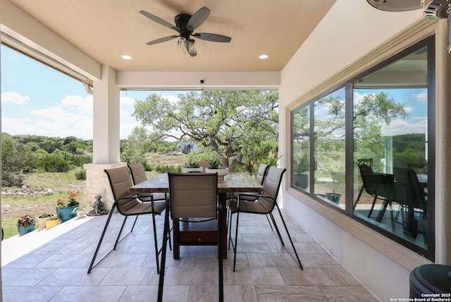 view of patio / terrace featuring ceiling fan