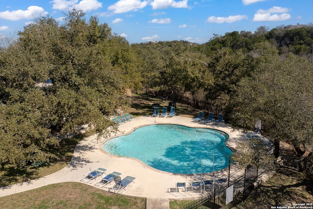 view of swimming pool featuring a patio