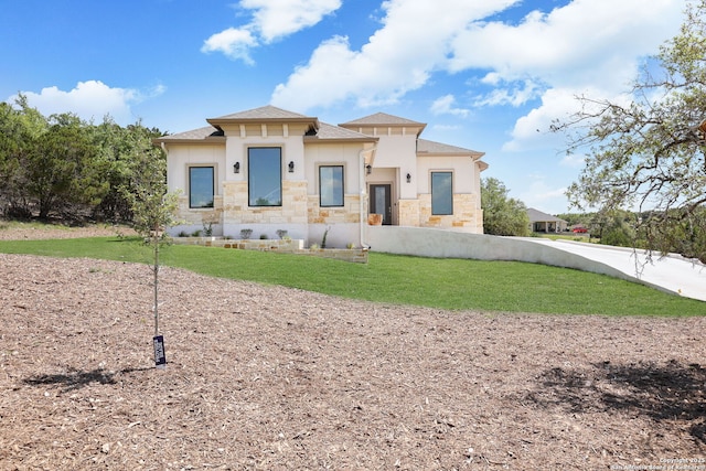 view of front of property with a front yard