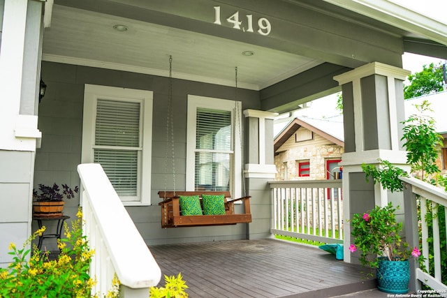 deck with covered porch