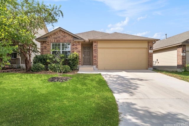 ranch-style home with a garage and a front yard