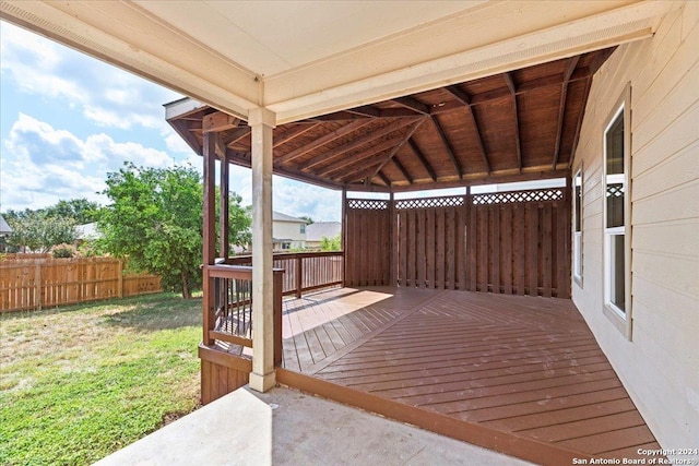 deck featuring a lawn