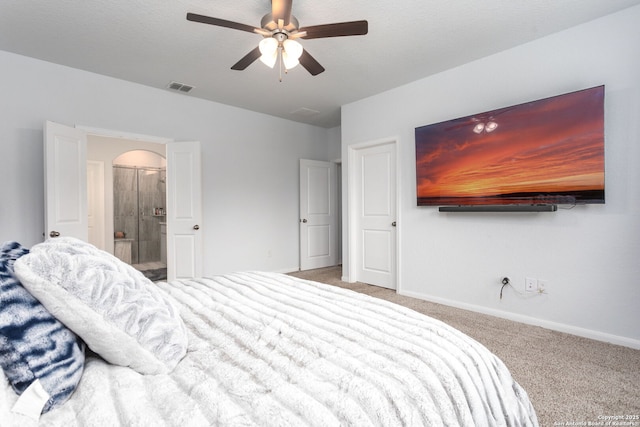 25046 Las Pilas, San Antonio, TX 78261 - bedroom featuring ceiling fan, ensuite bath, carpet floors, and a textured ceiling