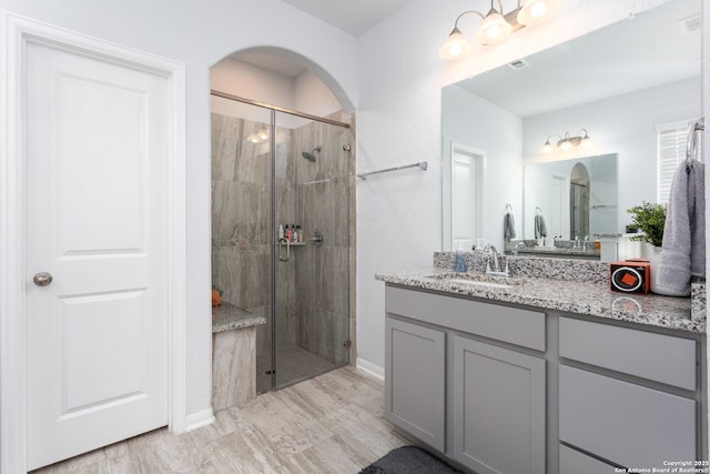 25046 Las Pilas, San Antonio, TX 78261 - bathroom with vanity and an enclosed shower