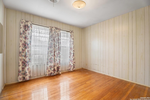 empty room featuring wood-type flooring