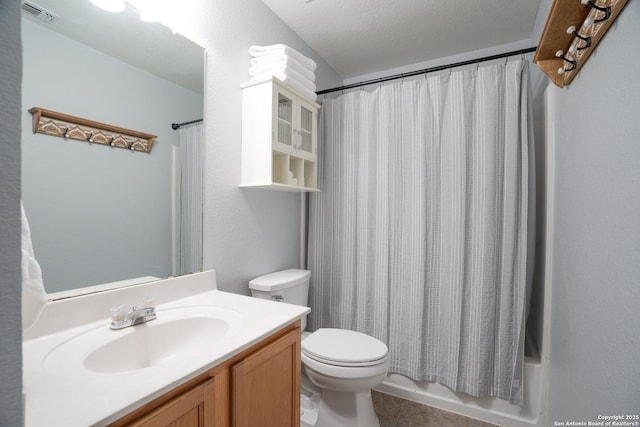 full bathroom with shower / tub combo with curtain, tile patterned floors, toilet, a textured ceiling, and vanity