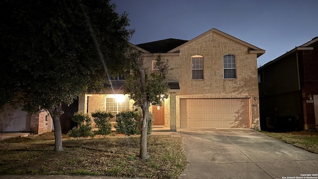 view of front of home with a garage