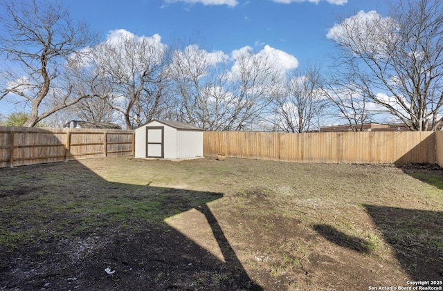 view of yard with a storage unit