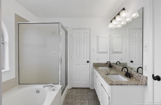 bathroom featuring vanity, tile patterned floors, and plus walk in shower