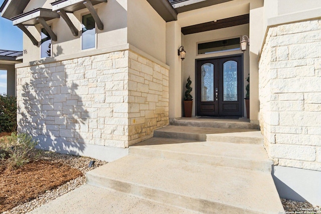 doorway to property with french doors