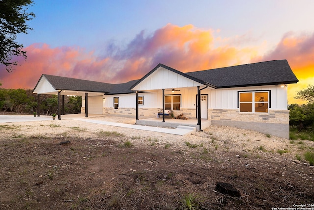 modern farmhouse featuring a patio area