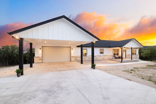 modern farmhouse style home featuring a garage