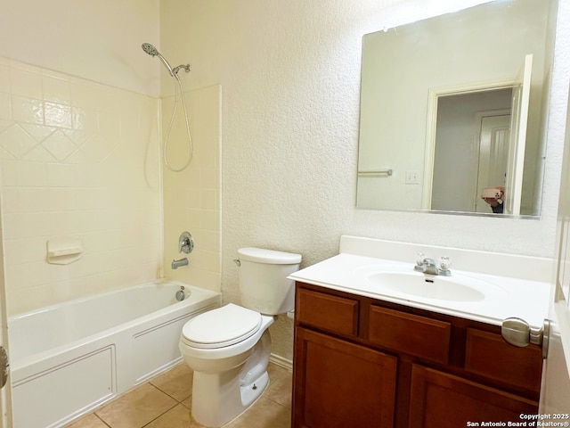 full bathroom with vanity, tile patterned floors, toilet, and shower / washtub combination