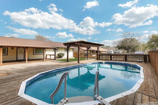 view of swimming pool featuring a deck