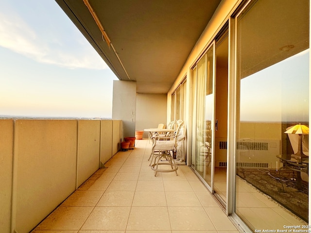 balcony at dusk with radiator heating unit