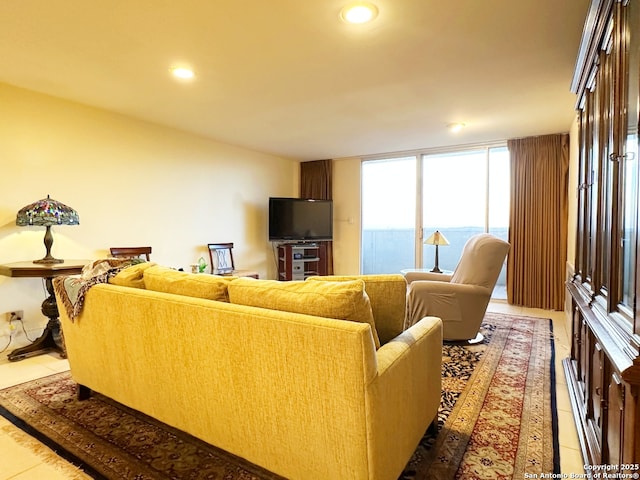 living room with tile patterned flooring