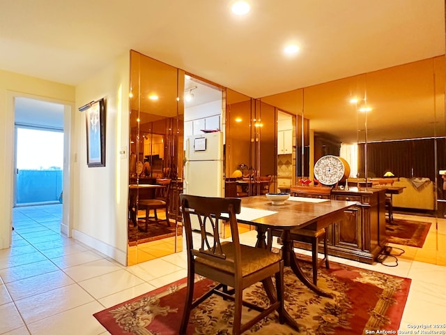 dining room with light tile patterned floors