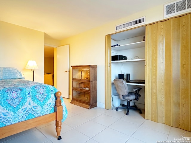 bedroom featuring tile patterned flooring