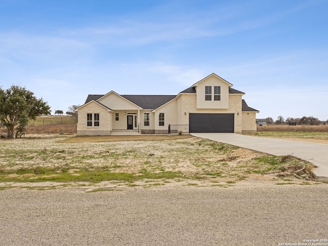 view of front of property featuring a garage