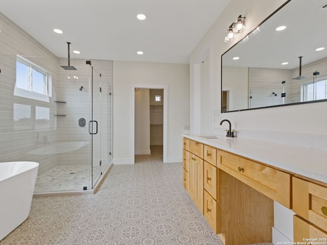 bathroom with vanity, separate shower and tub, and tile patterned flooring