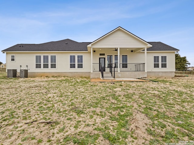 back of property with cooling unit and ceiling fan