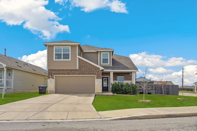 view of front facade with a garage and a front lawn