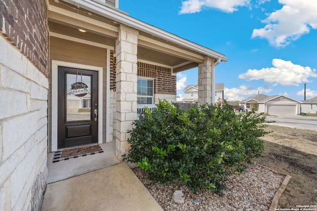 property entrance with a garage