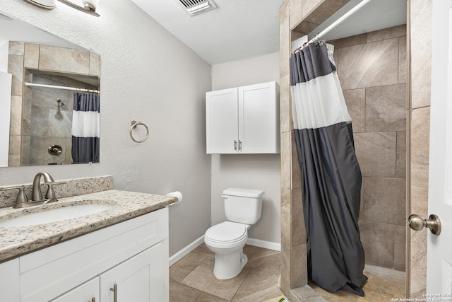 bathroom featuring vanity, toilet, and a shower with shower curtain