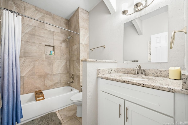 full bathroom featuring shower / bathtub combination with curtain, vanity, tile patterned flooring, and toilet