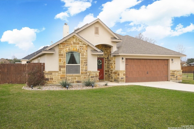 view of front of house featuring a garage and a front yard