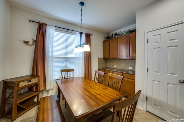 dining room featuring light tile patterned floors