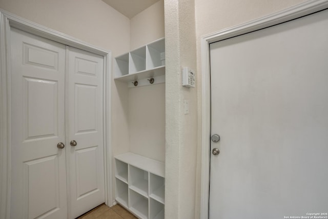 mudroom featuring light tile patterned flooring