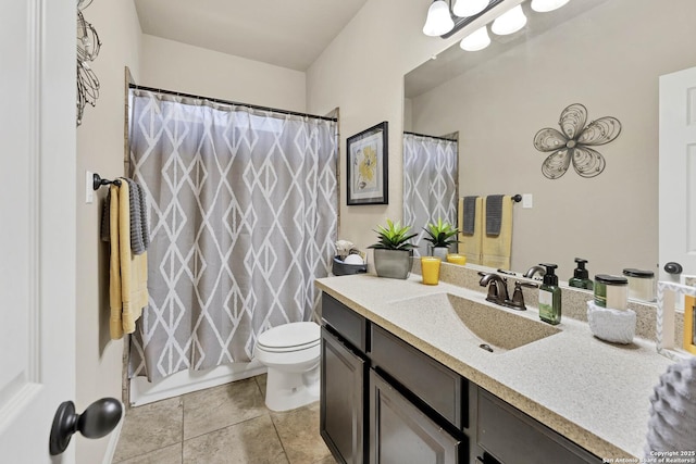 full bathroom with shower / bath combination with curtain, vanity, tile patterned floors, and toilet