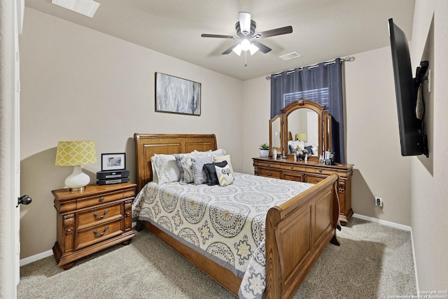 bedroom with light carpet and ceiling fan