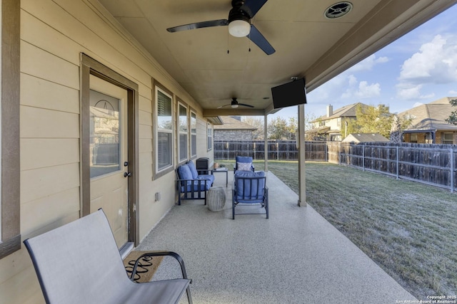 view of patio / terrace featuring ceiling fan